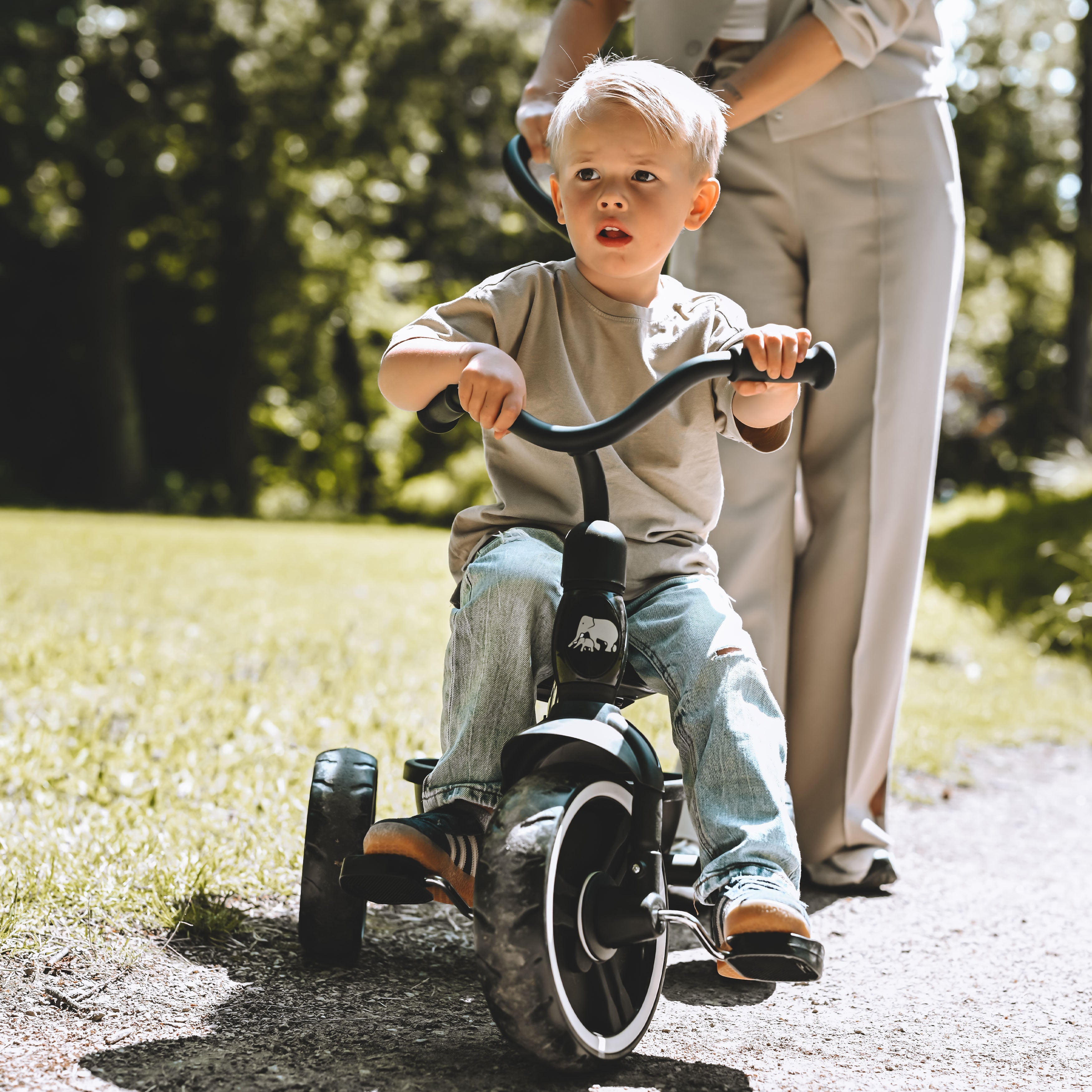 Trehjulet cykel med skubbestang