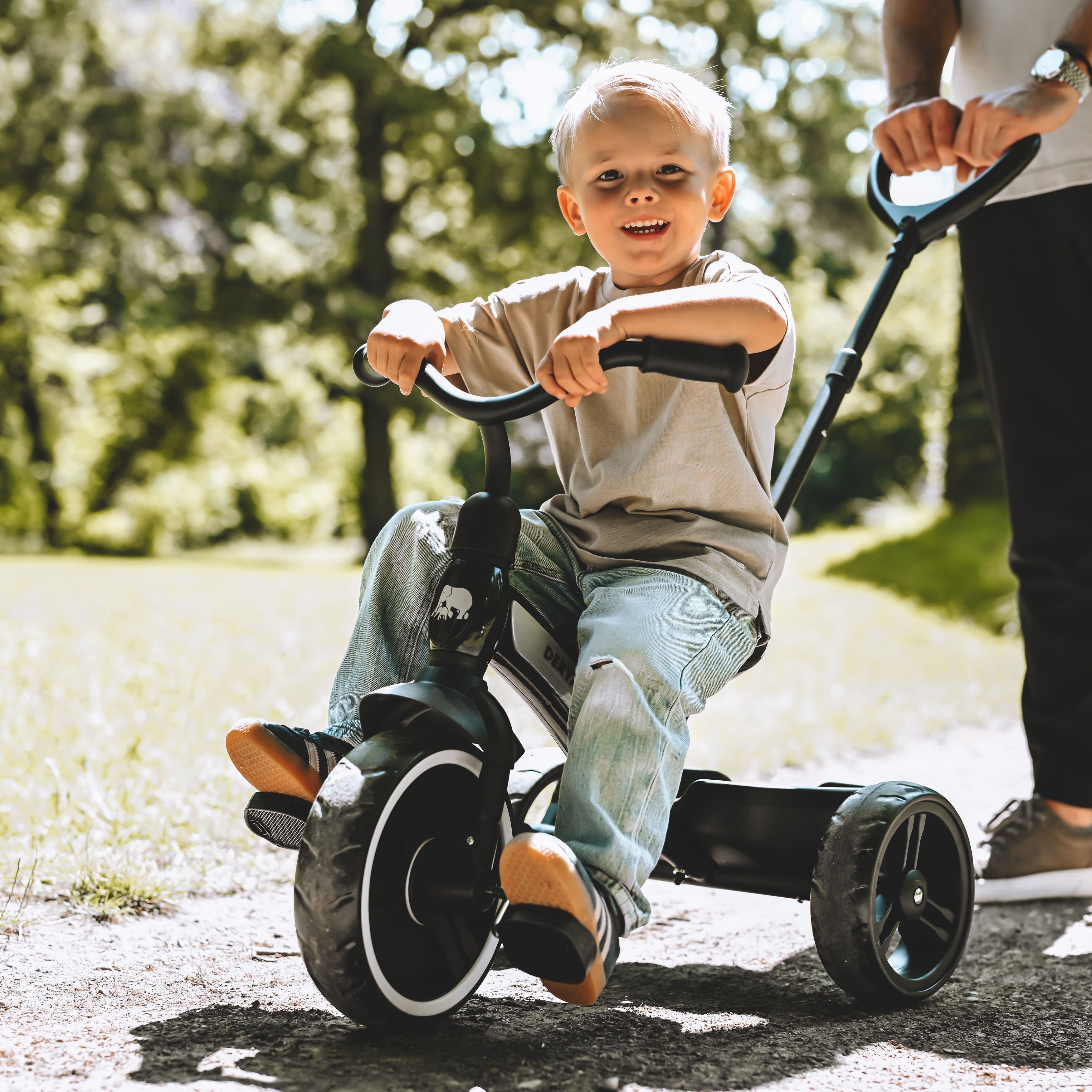 Trehjulet cykel med skubbestang